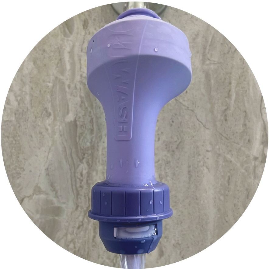 Close-up view of Squwash's patented stretch-to-fit connector attached to a showerhead demonstrating its self-sealing mechanism