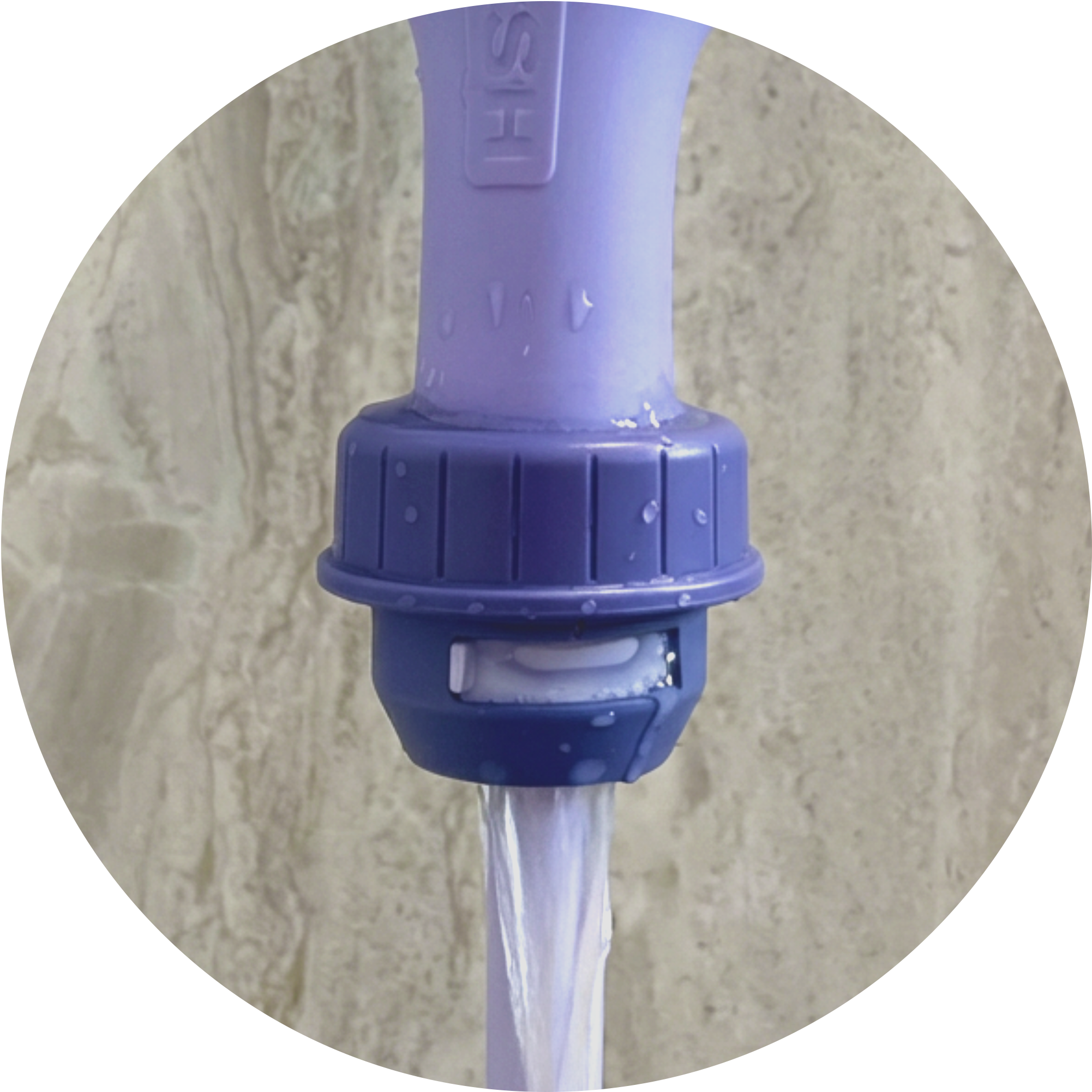 Close-up view of Squwash's patented built-in adjustable water pressure release valve as water flows discreetly through the system shown against a beige background