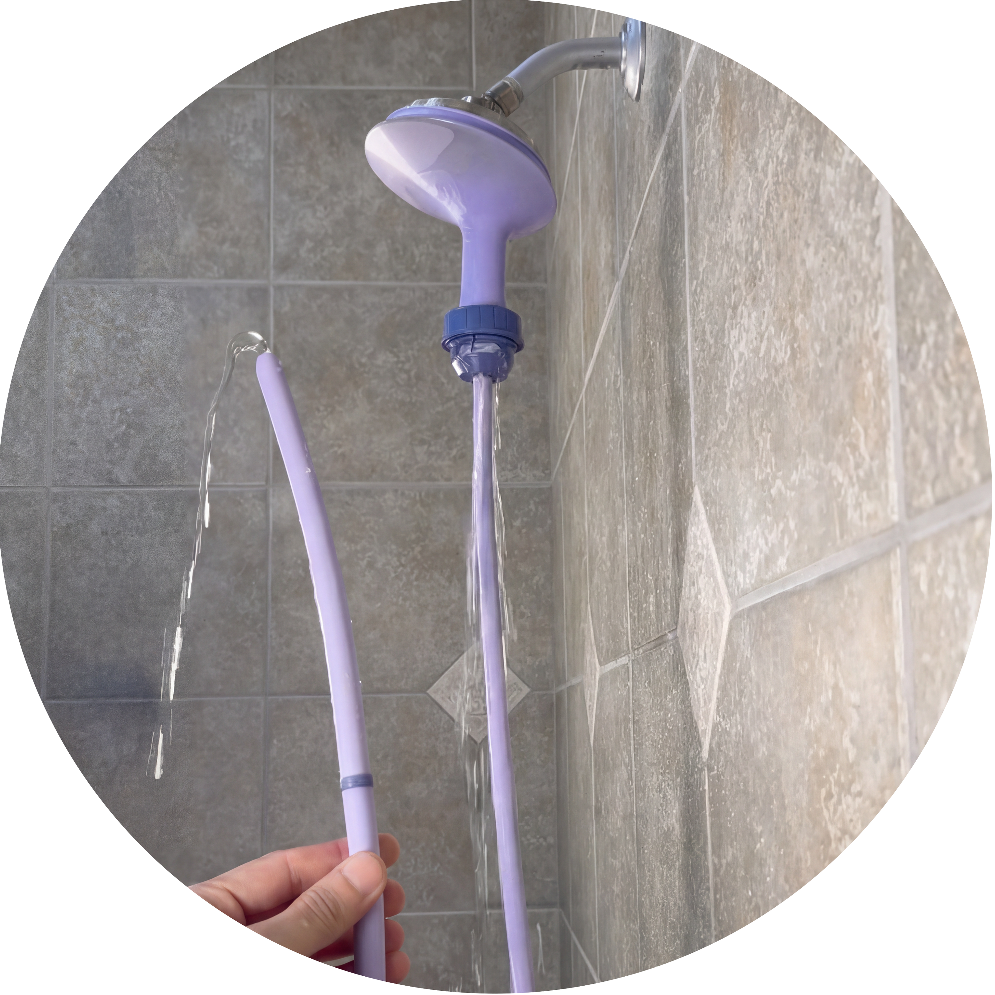Squwash douche attached to shower as water flows through tip
